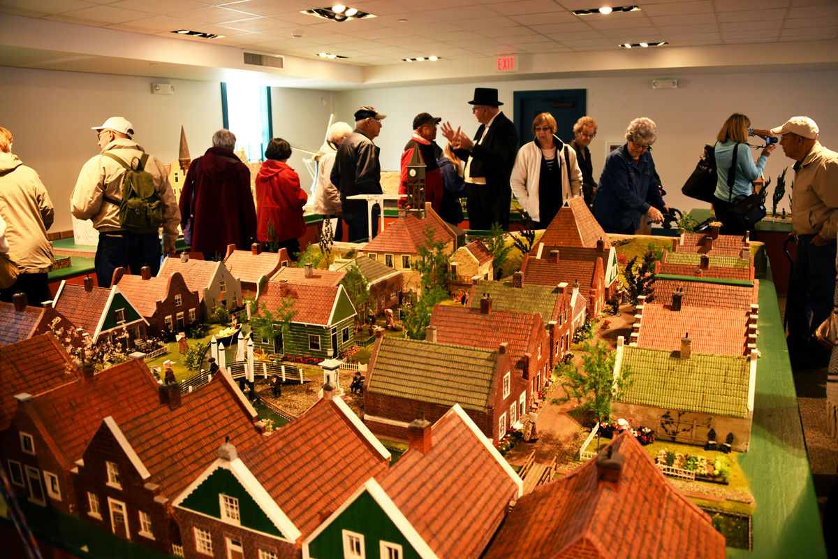 176 The Fun Club and others view the miniature Dutch village.JPG